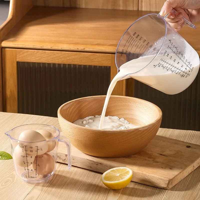 measuring cup with scale handle measuring cup with scale handle