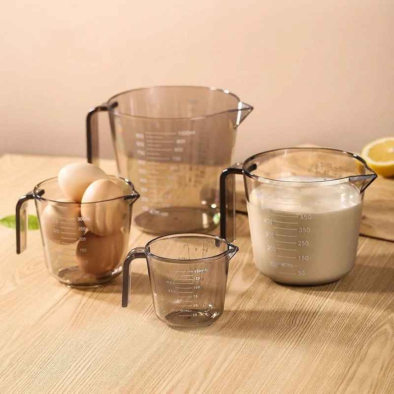 measuring cup with scale handle measuring cup with scale handle